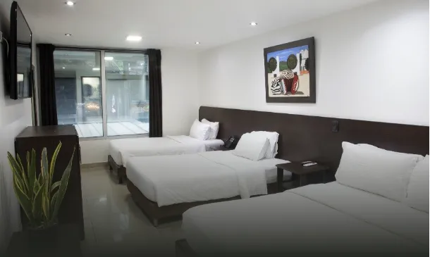 Habitación triple de Hotel Beli en Medellín